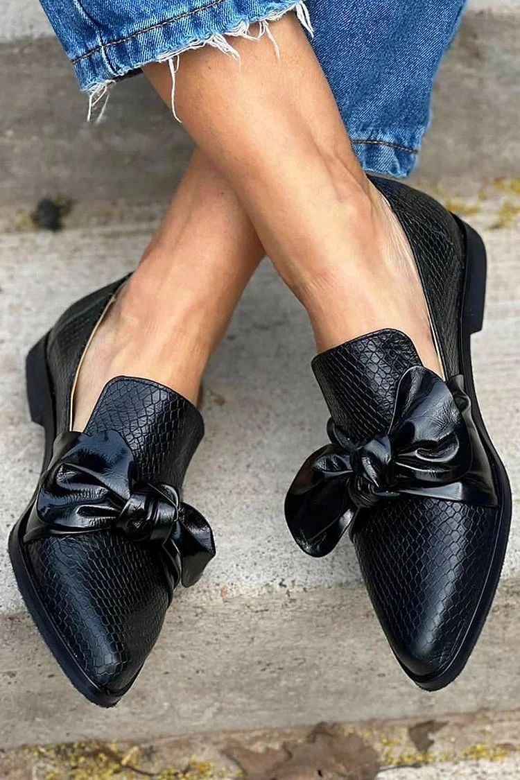 Black Snakeskin-Print Loafers with Knotted Bow and Pointed Toe