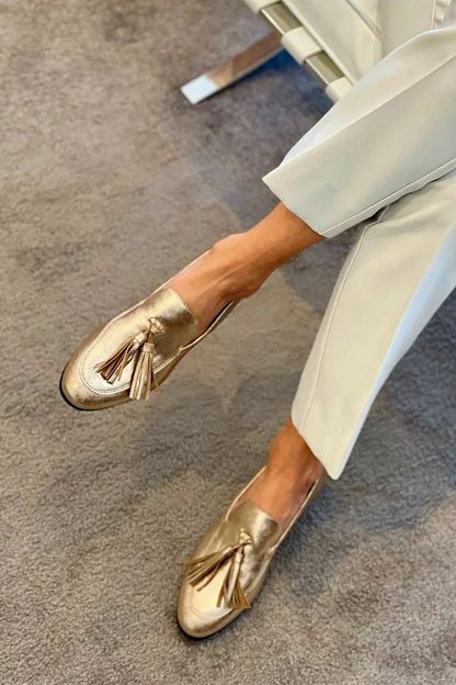 Shiny Metallic Gold Loafers with Visible Stitching